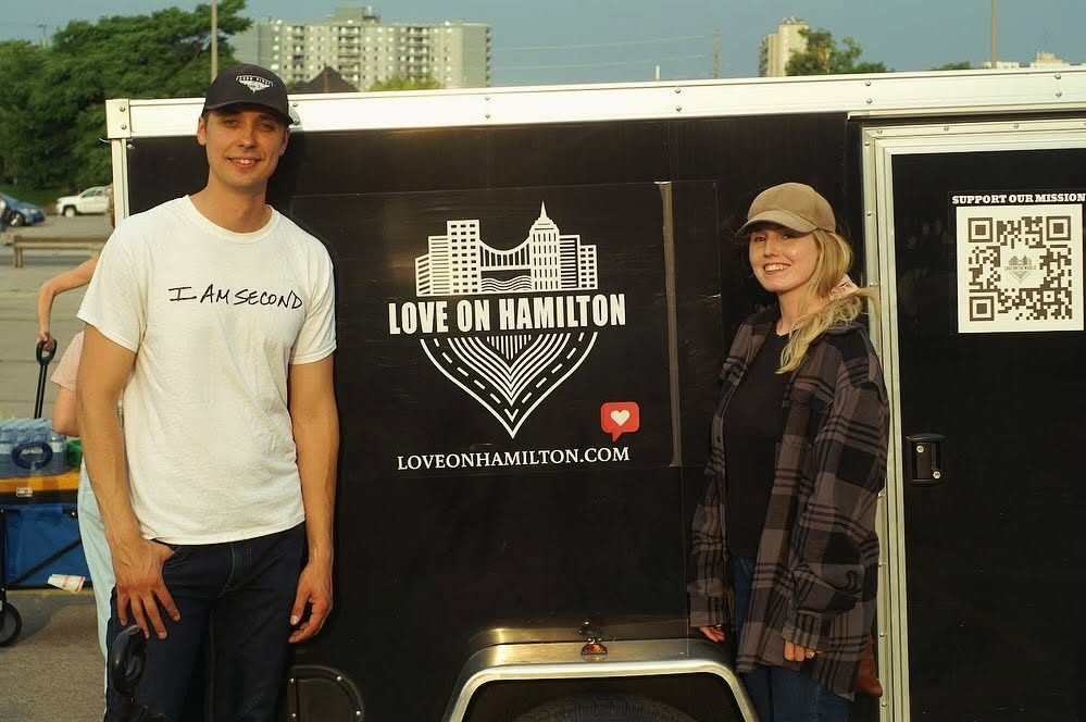 Daniel and Katie Ziedins at a Love on Hamilton outreach